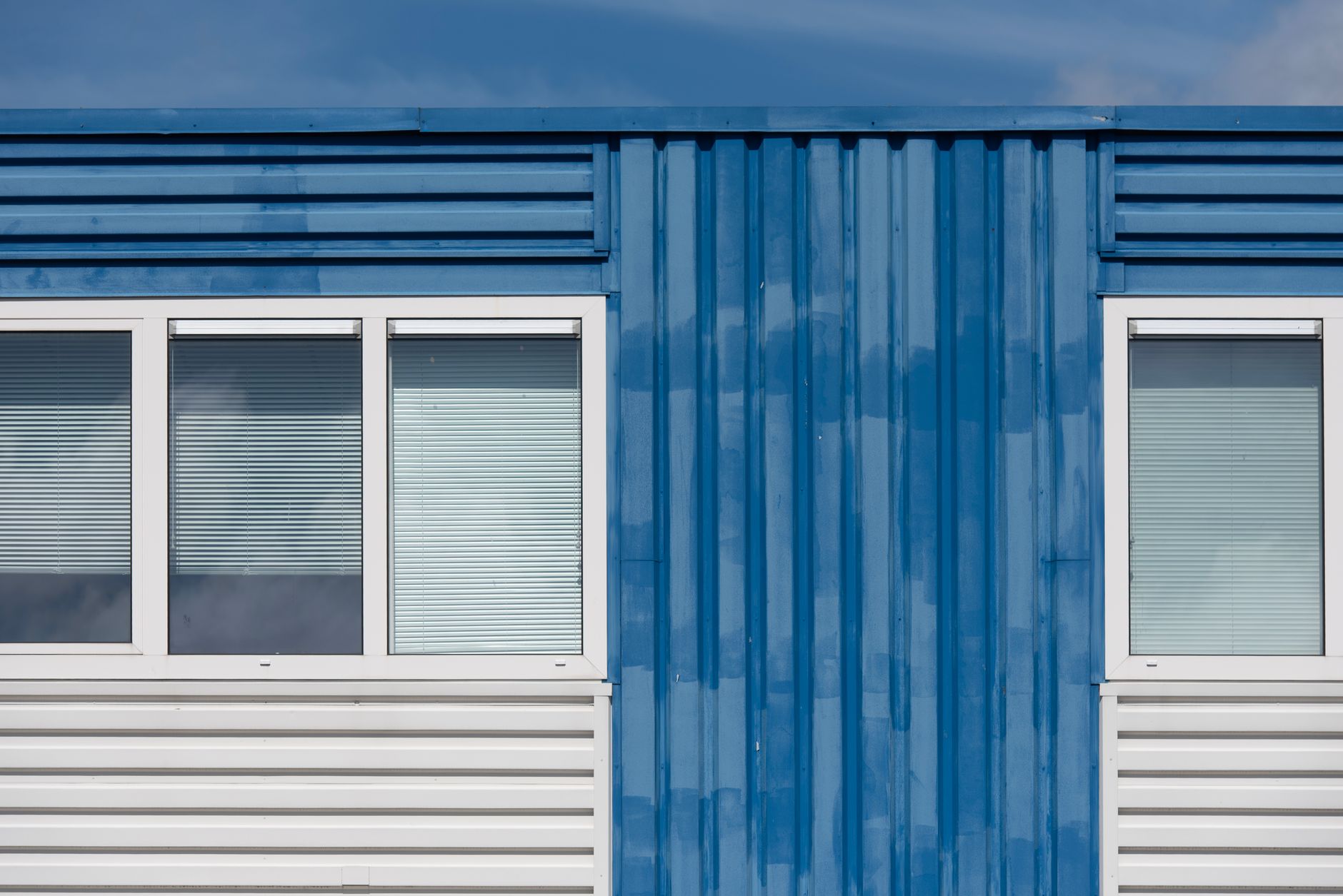 Exterior of a blue modular building